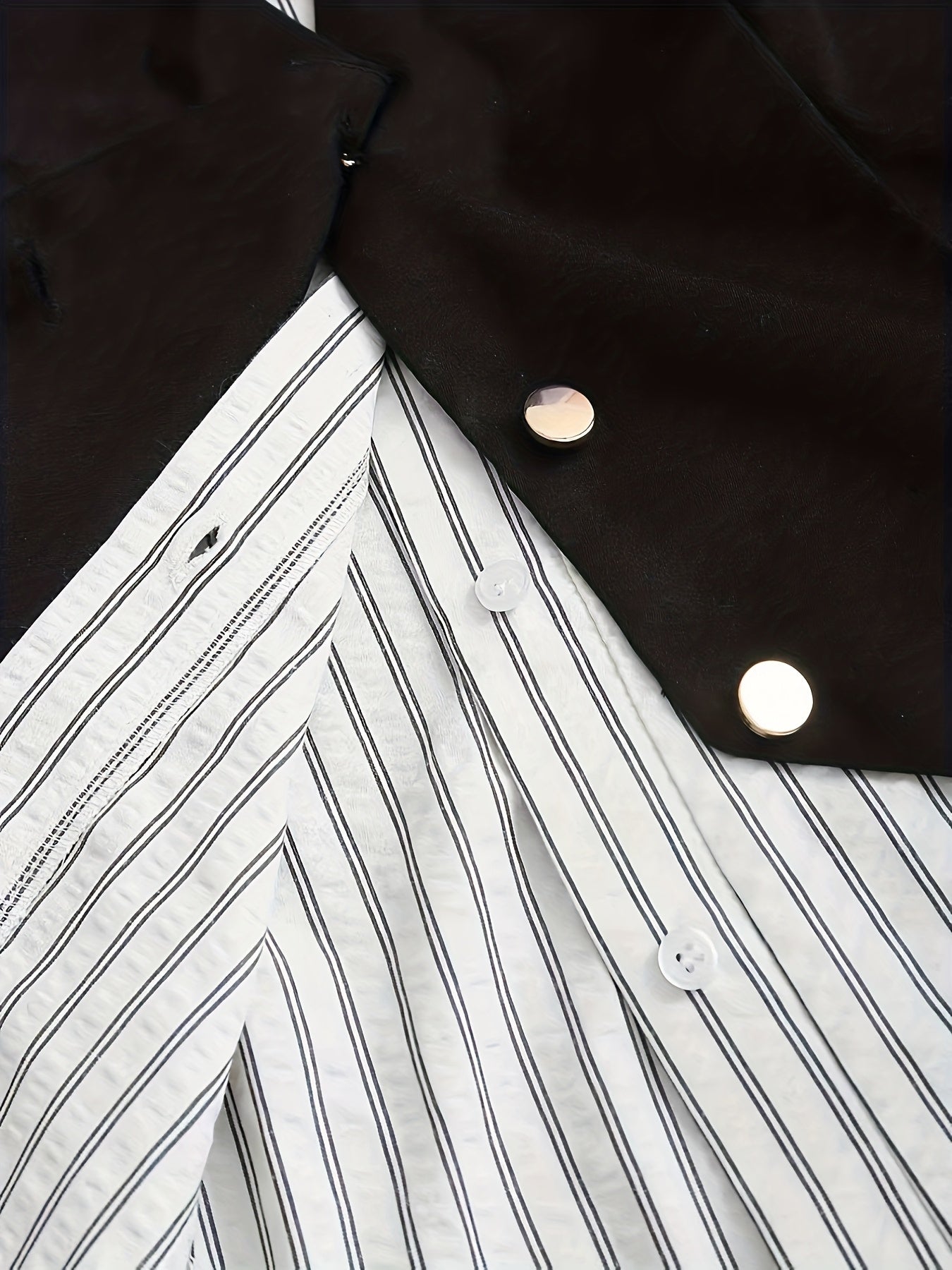 Women's striped black-and-white blouse and vest set