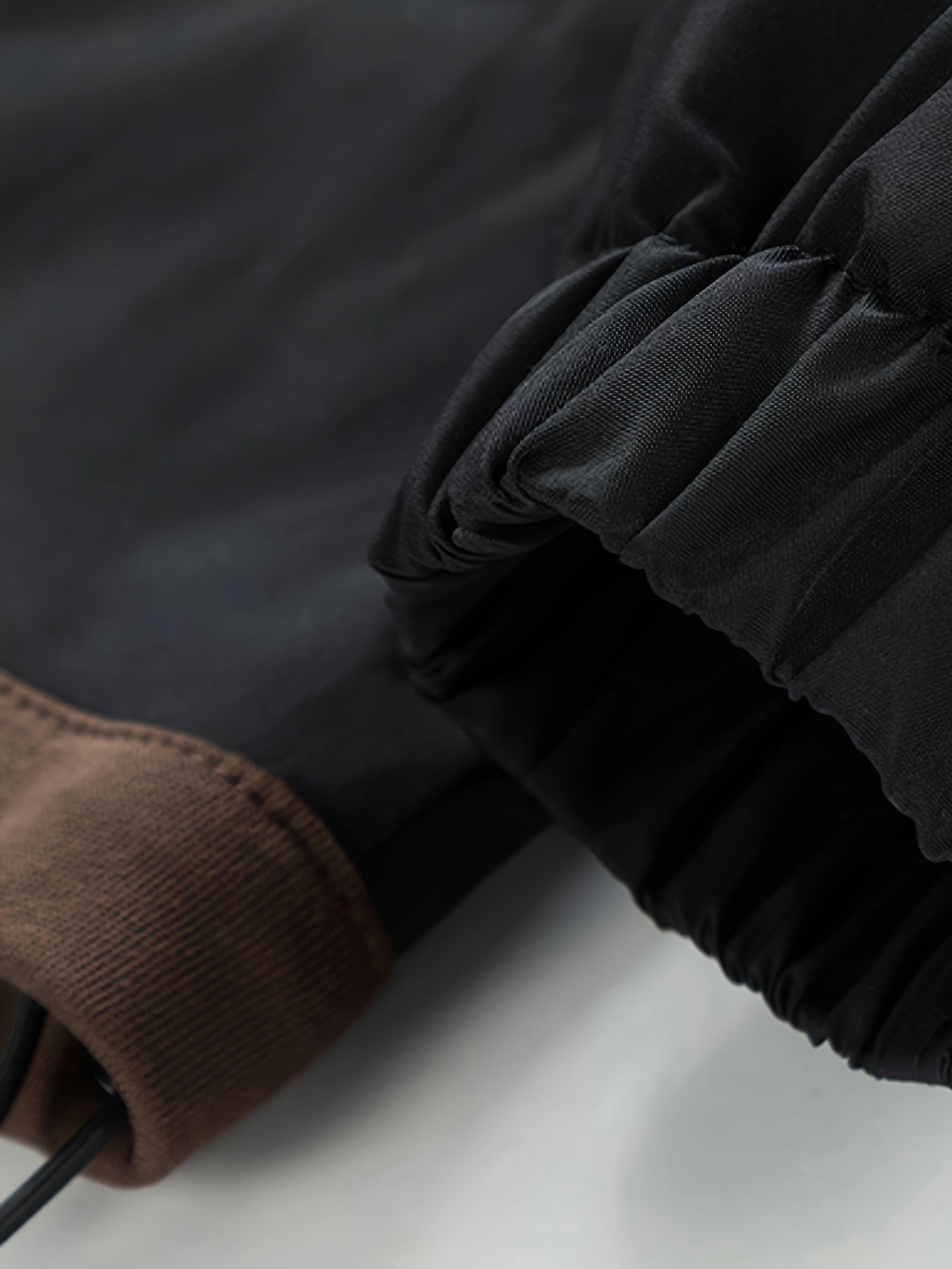 Unisex transitional jacket with hood and zipper, two-in-one look, black/brown