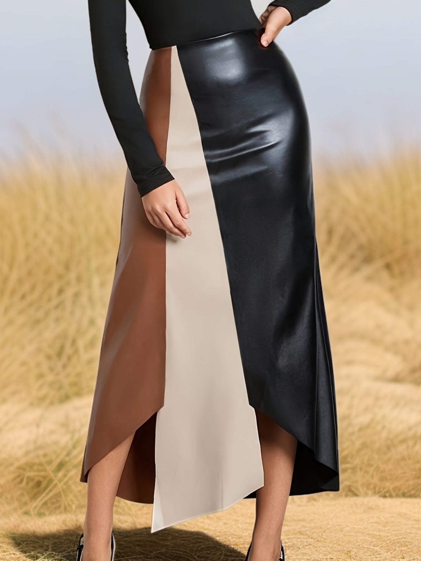 Color-block midi skirt with an asymmetrical faux-leather hem