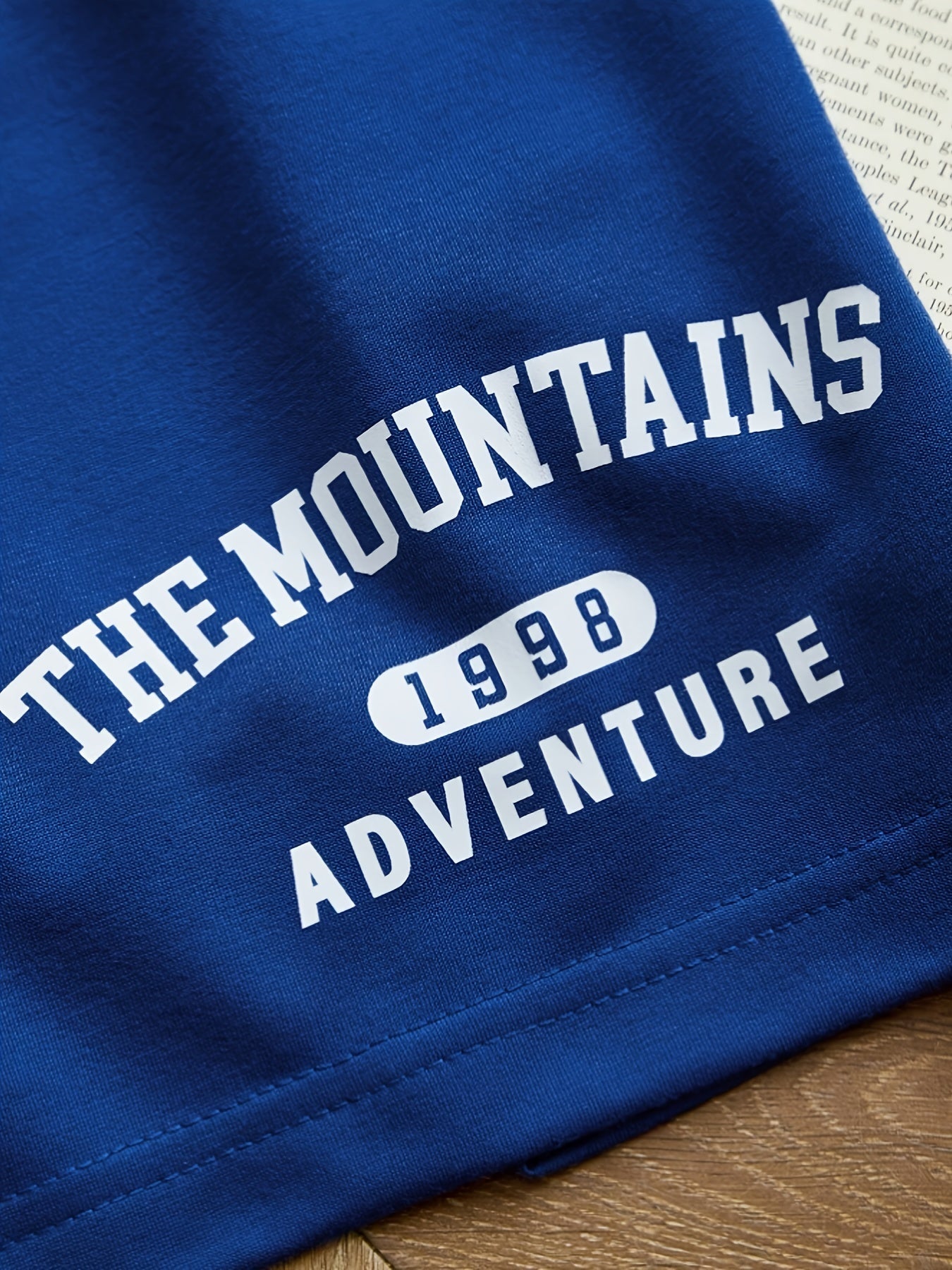 Women's sporty casual set with "The Mountains Adventure" print – top & shorts – perfect for summer & outdoor activities