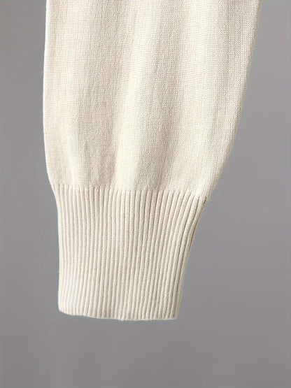 Two-piece women’s knitted set with a V-neck sweater and jogger pants in a beige ribbed-knit design