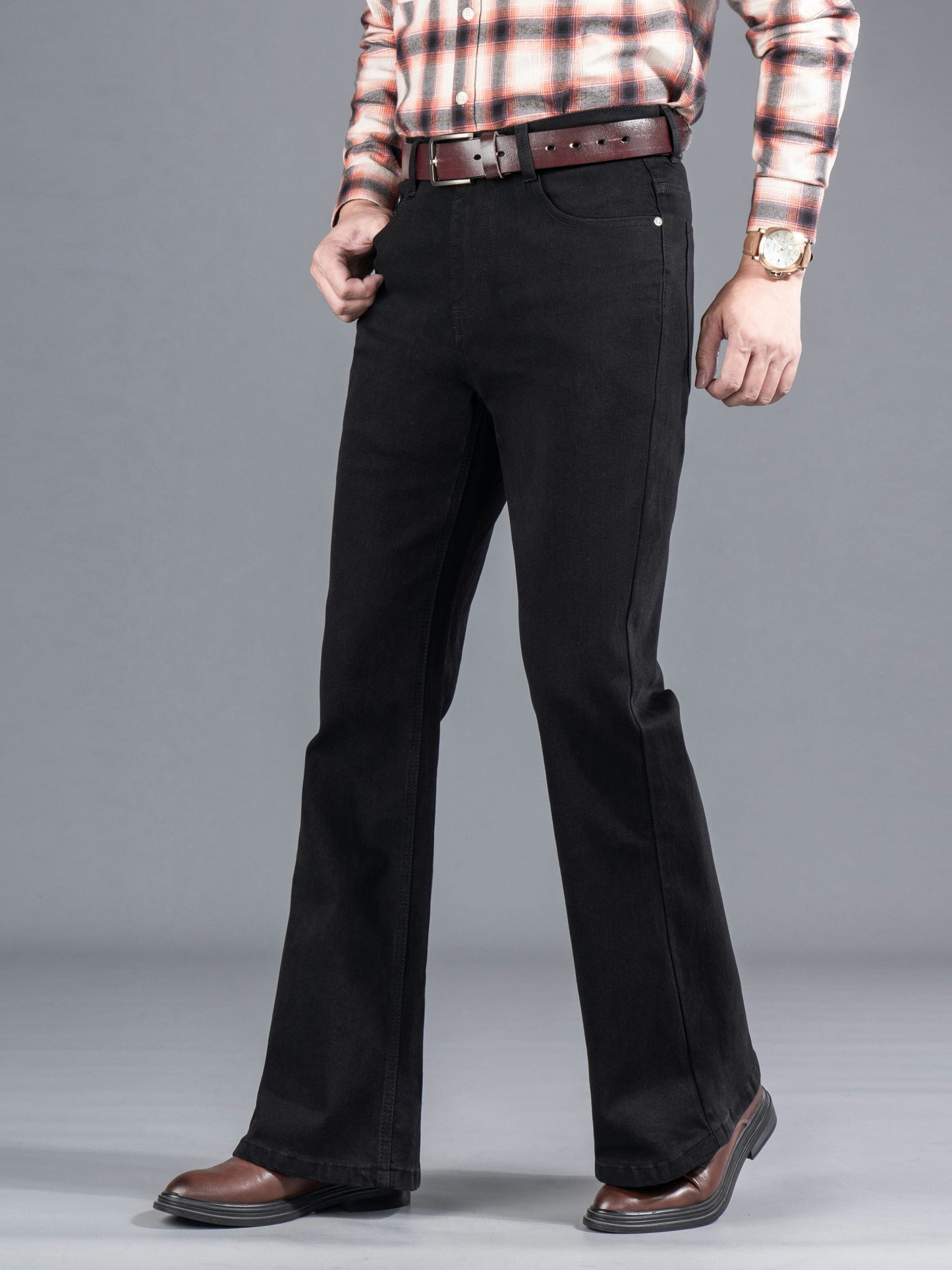 Men's black bootcut jeans with a flared leg, regular fit