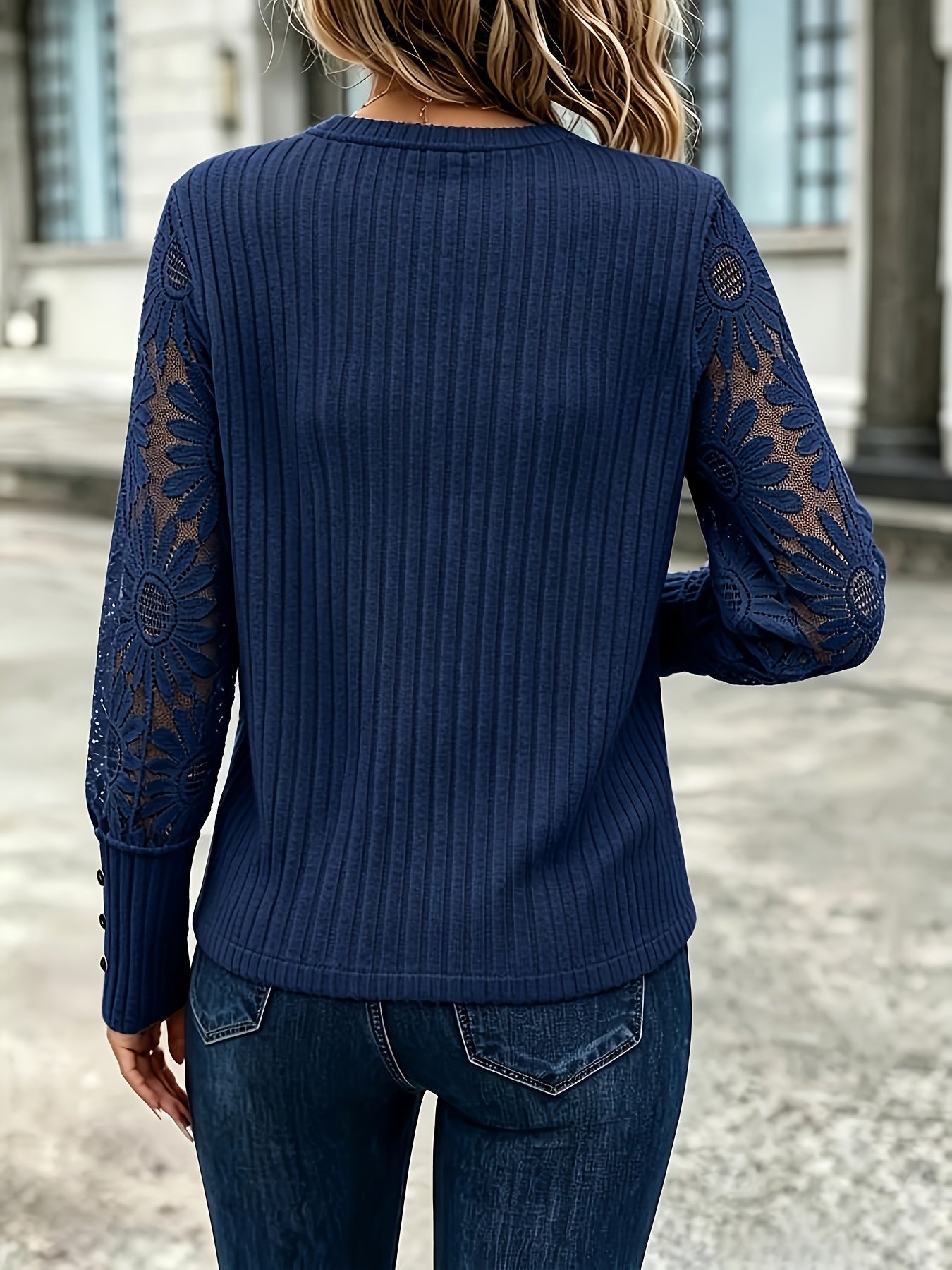 Women's rib-knit sweater with lace sleeves and a crew neck