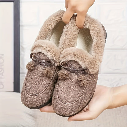 Women's black plush slippers with a bow