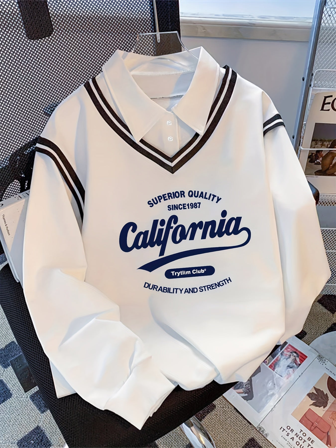 White long-sleeve sweater with collar and California lettering