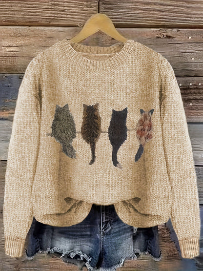 Women's knitted sweater with round neckline and cat motif