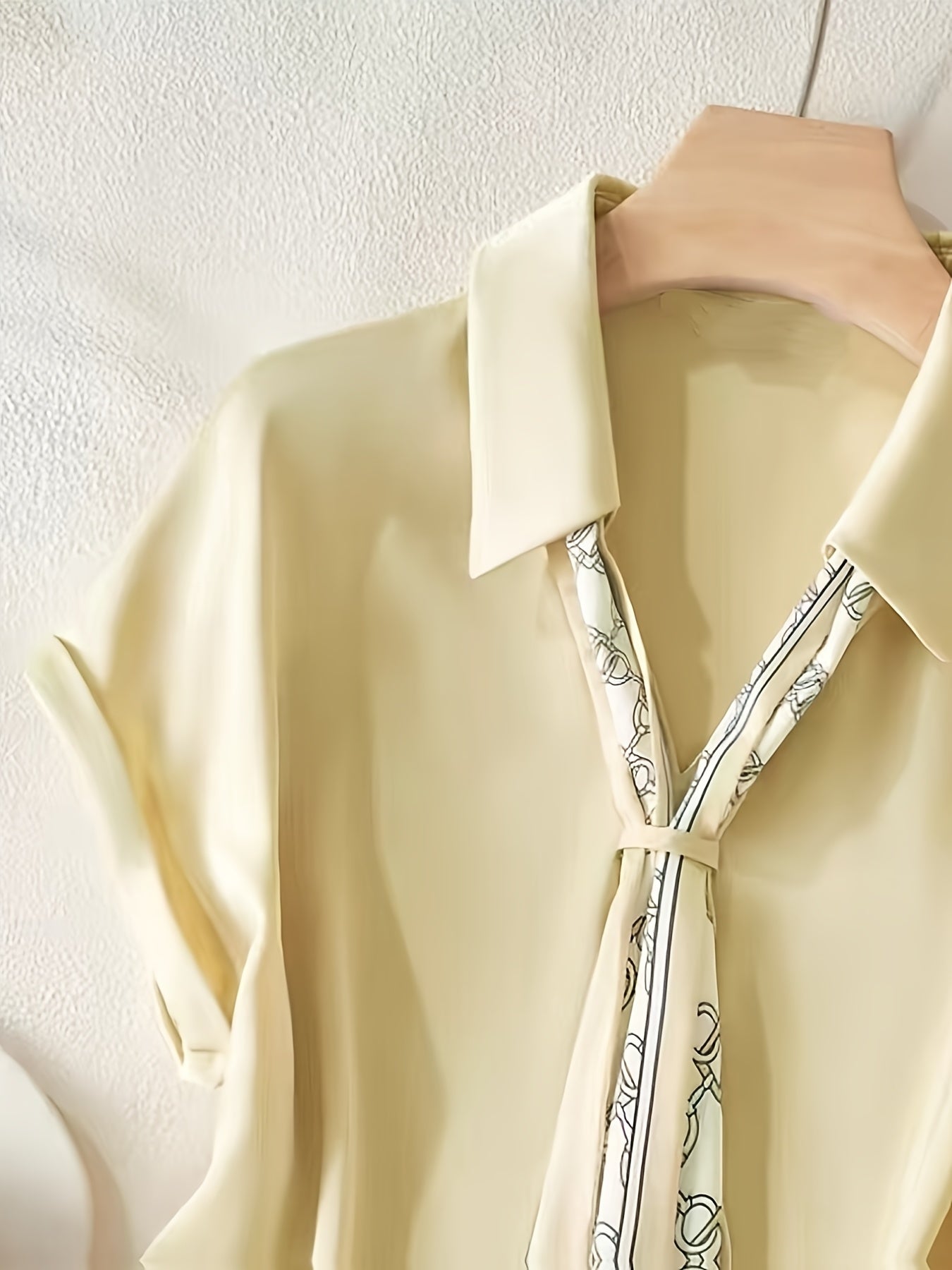 Women's blouse with short sleeves and decorative neck scarf – Elegant business and casual style