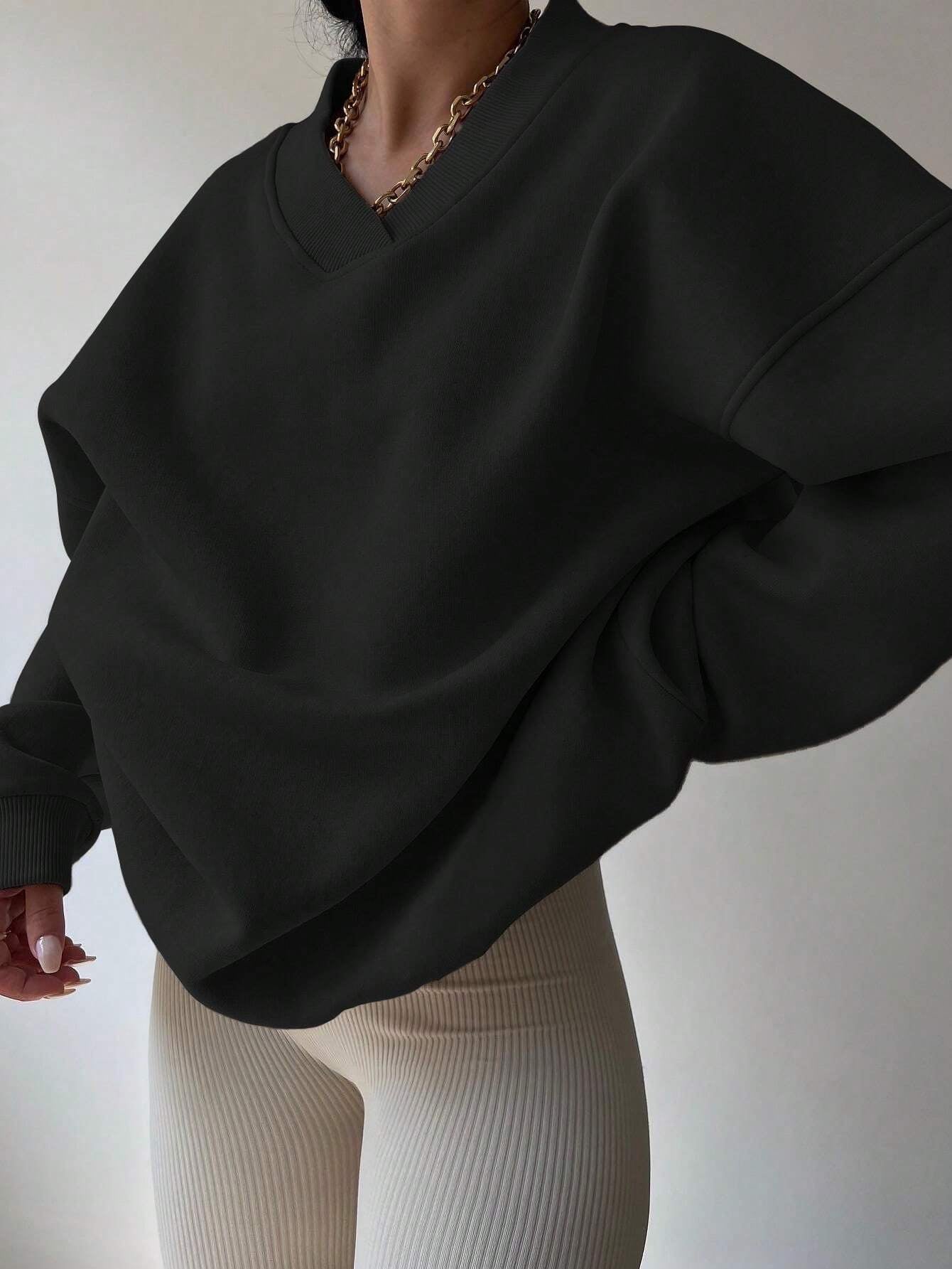 Black oversized V-neck sweatshirt for women