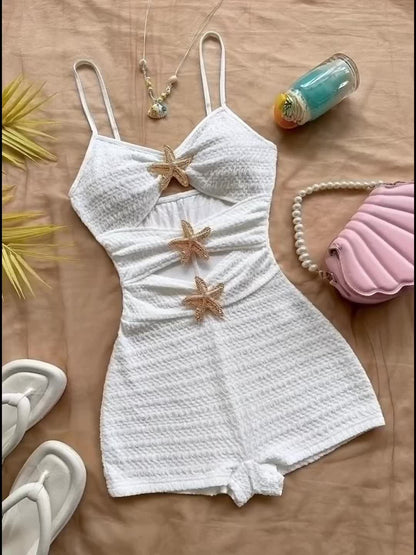 Women's beach jumpsuit with star appliqués and cut-outs – summery one-piece for vacation & pool parties