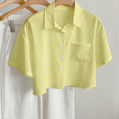 Women's short-sleeve blouse with crop cut and chest pocket – modern casual shirt