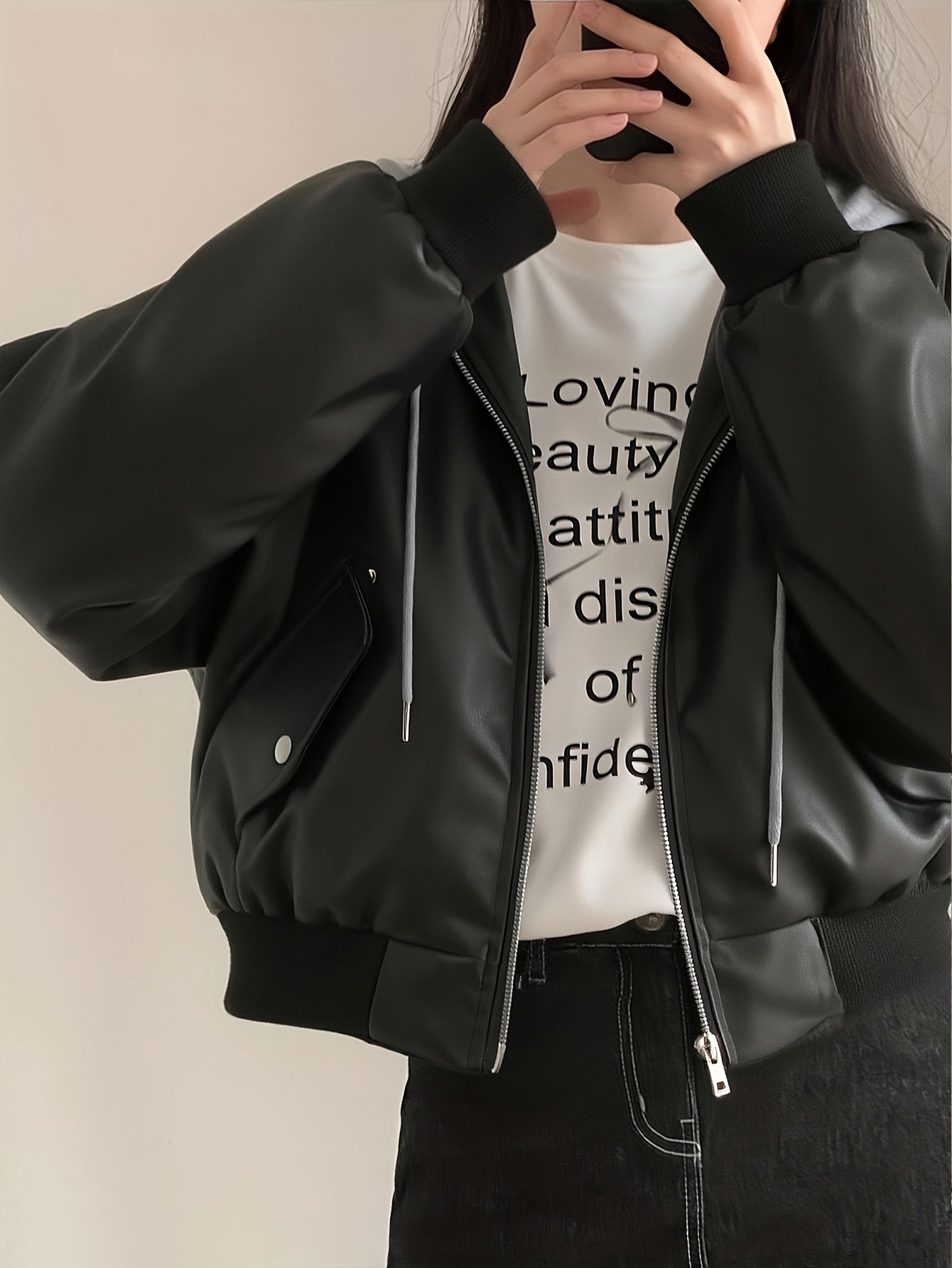 Unisex black bomber jacket with hood made of soft material