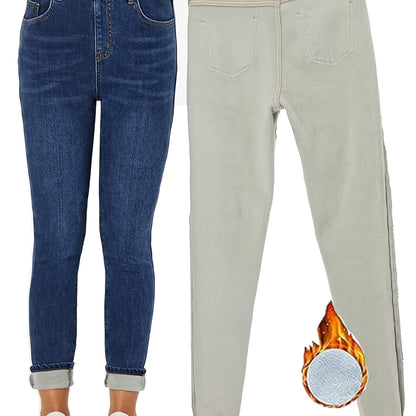 Lined women's skinny-fit jeans, dark blue stretch thermal jeans
