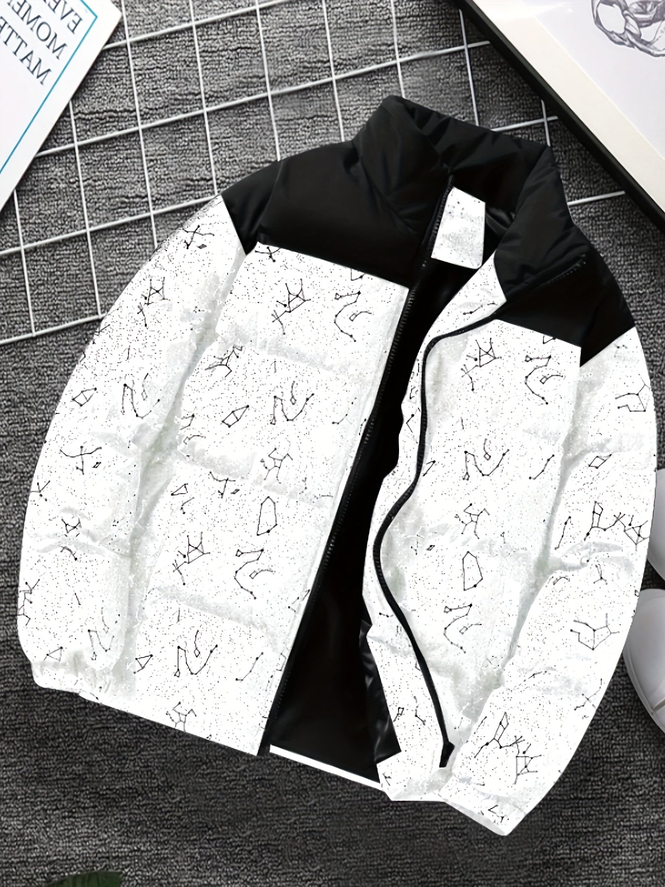 Padded jacket with constellation print, zipper, and stand-up collar