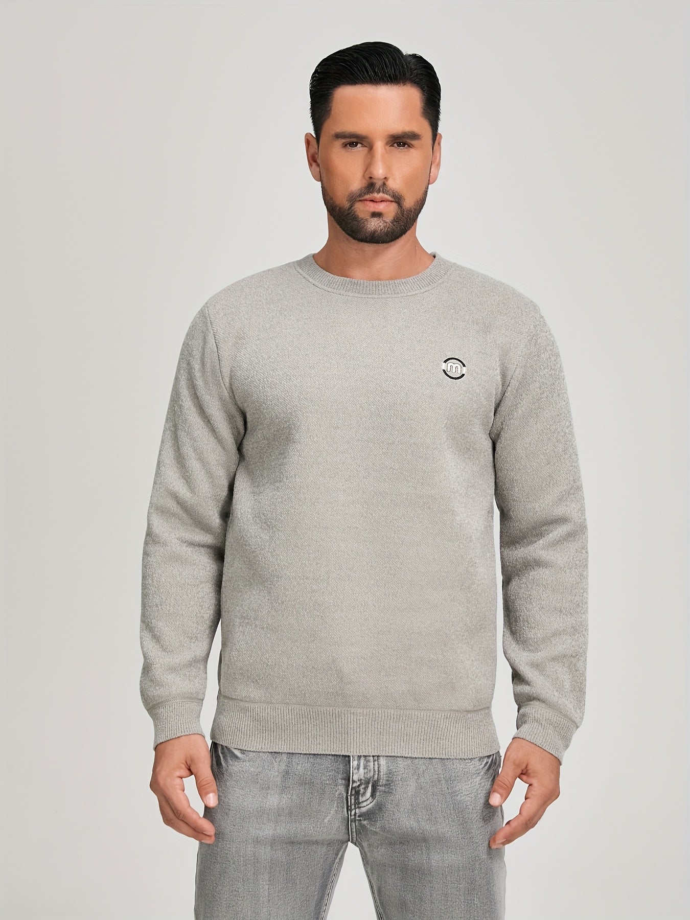 Unisex long-sleeve pullover with a crew neck and ribbed cuffs, lined