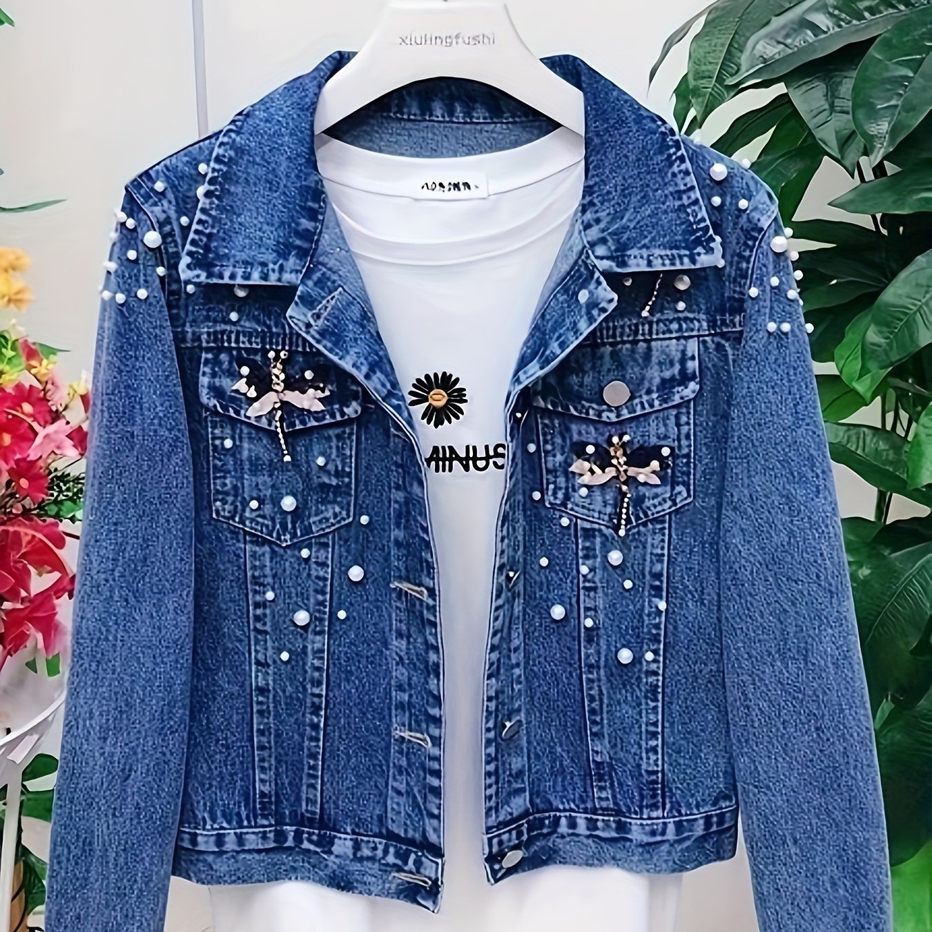Women's denim jacket with blue pearl embellishments