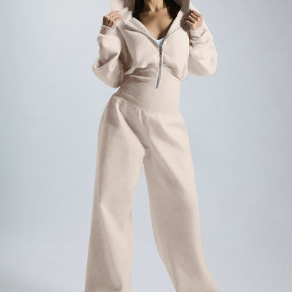 Women's jumpsuit with hood, long sleeves, wide legs, and zipper