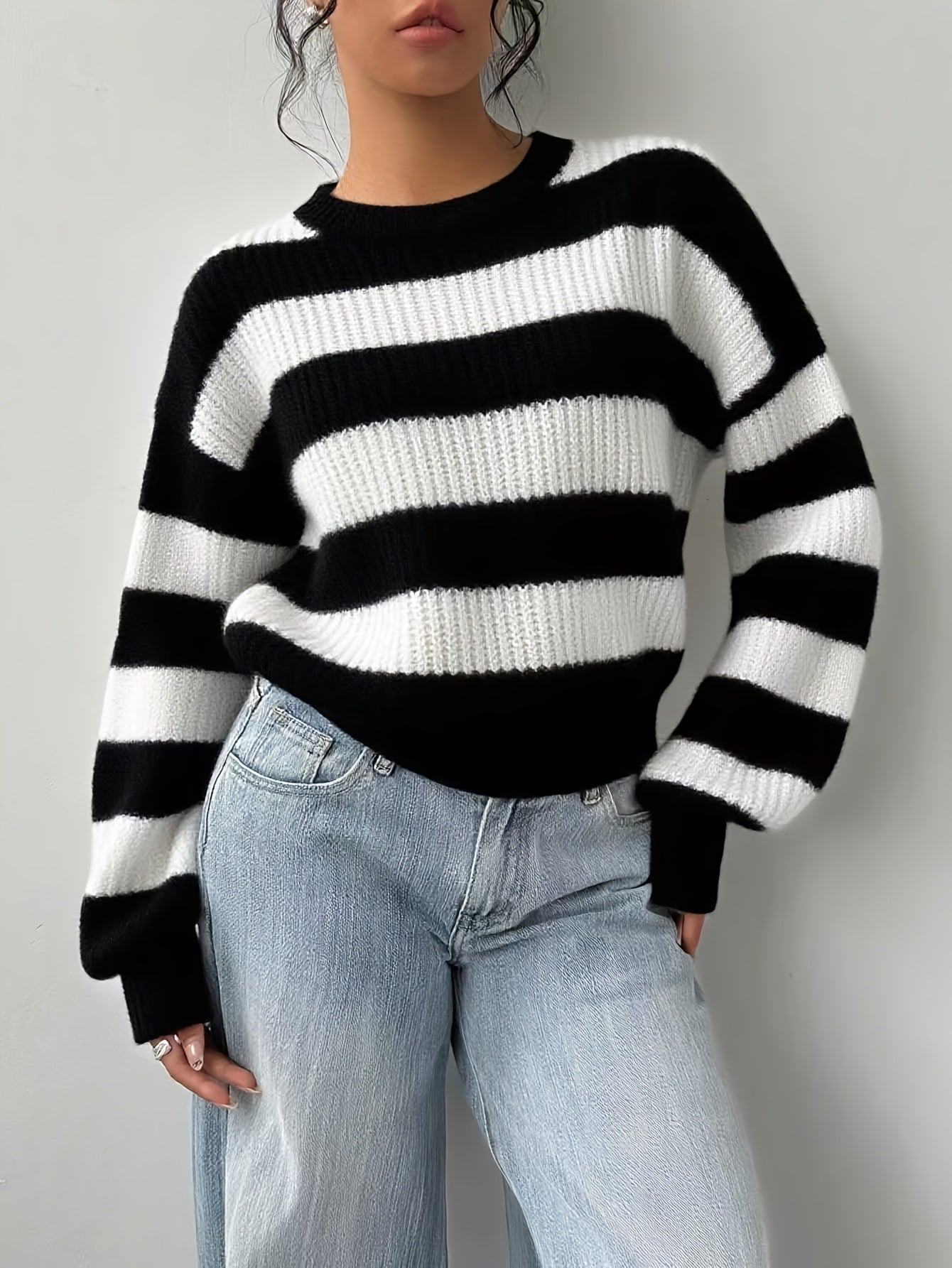 Women's knitted sweater, black and white striped, crew neck, loose fit