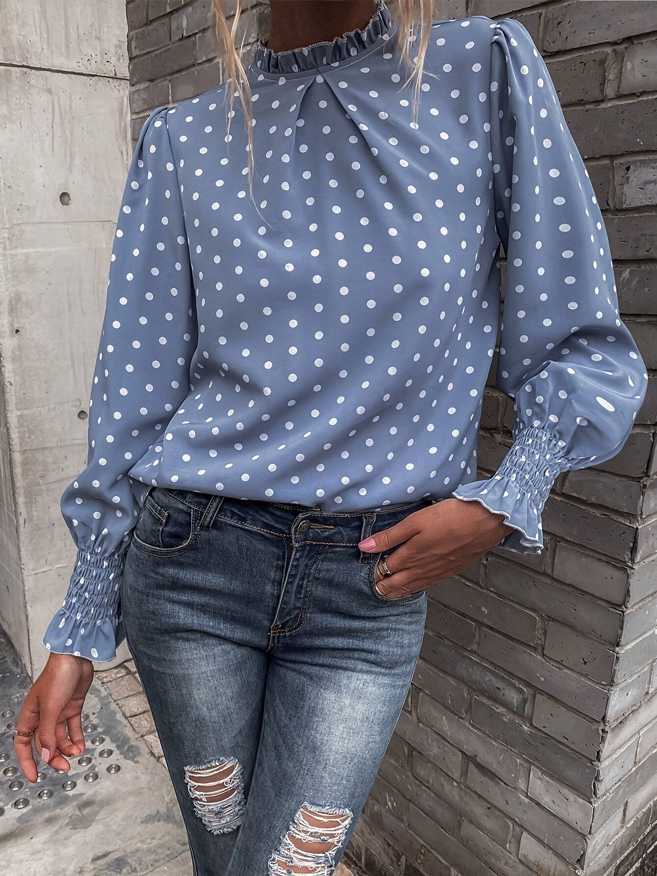 Women's blouse with polka-dot pattern, stand-up collar, and gathered sleeves