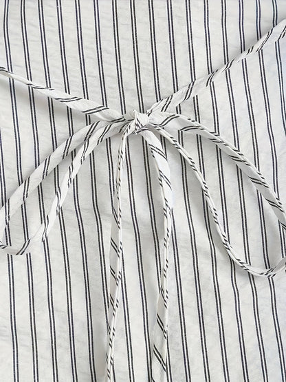Women's striped black-and-white blouse and vest set