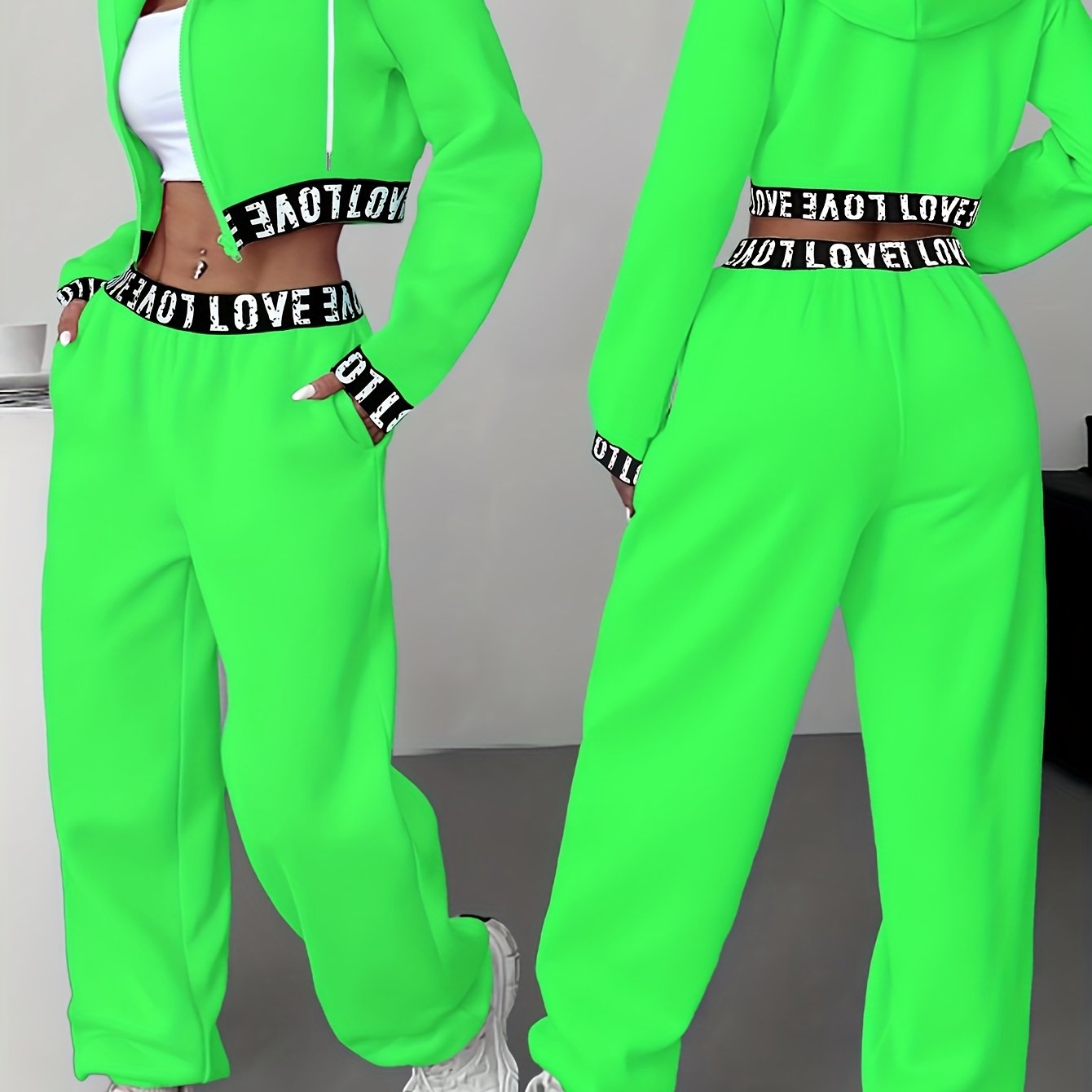 Women's two-piece tracksuit with a hooded jacket and cropped-length joggers featuring a “LOVE” waistband