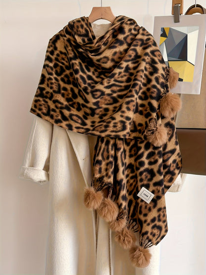 Leopard-print scarf with pom-poms