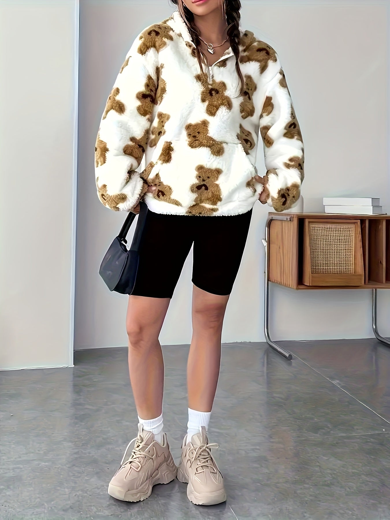 White fluffy hoodie with a brown teddy bear pattern for women