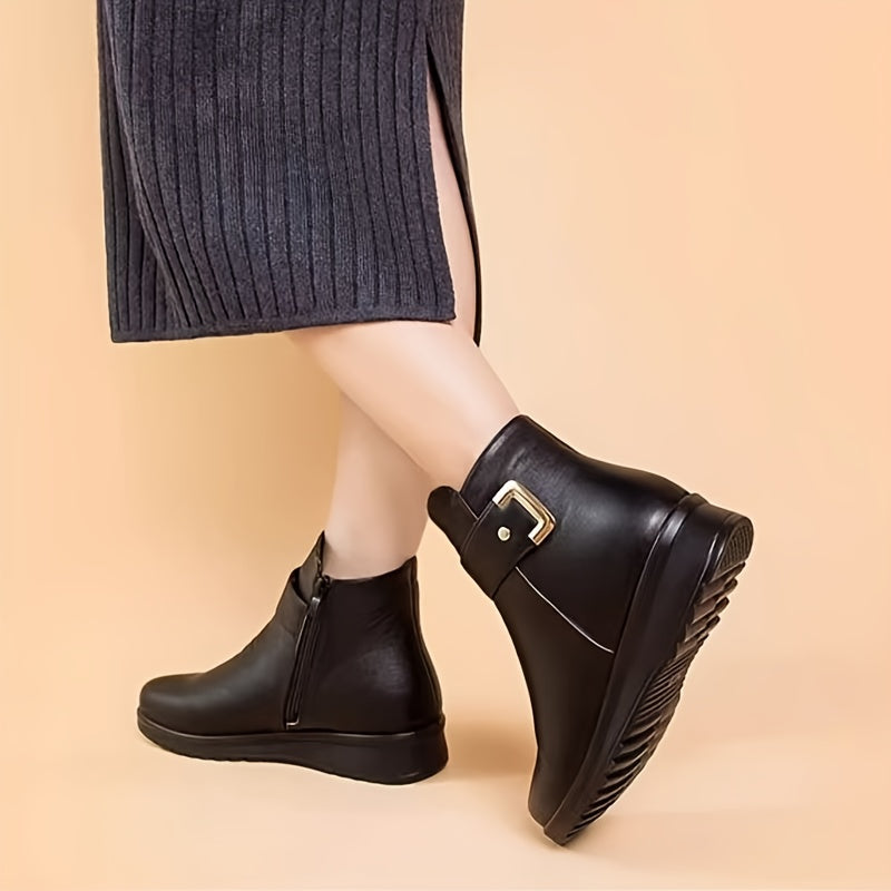 Women’s black winter ankle boots with warm lining and buckle