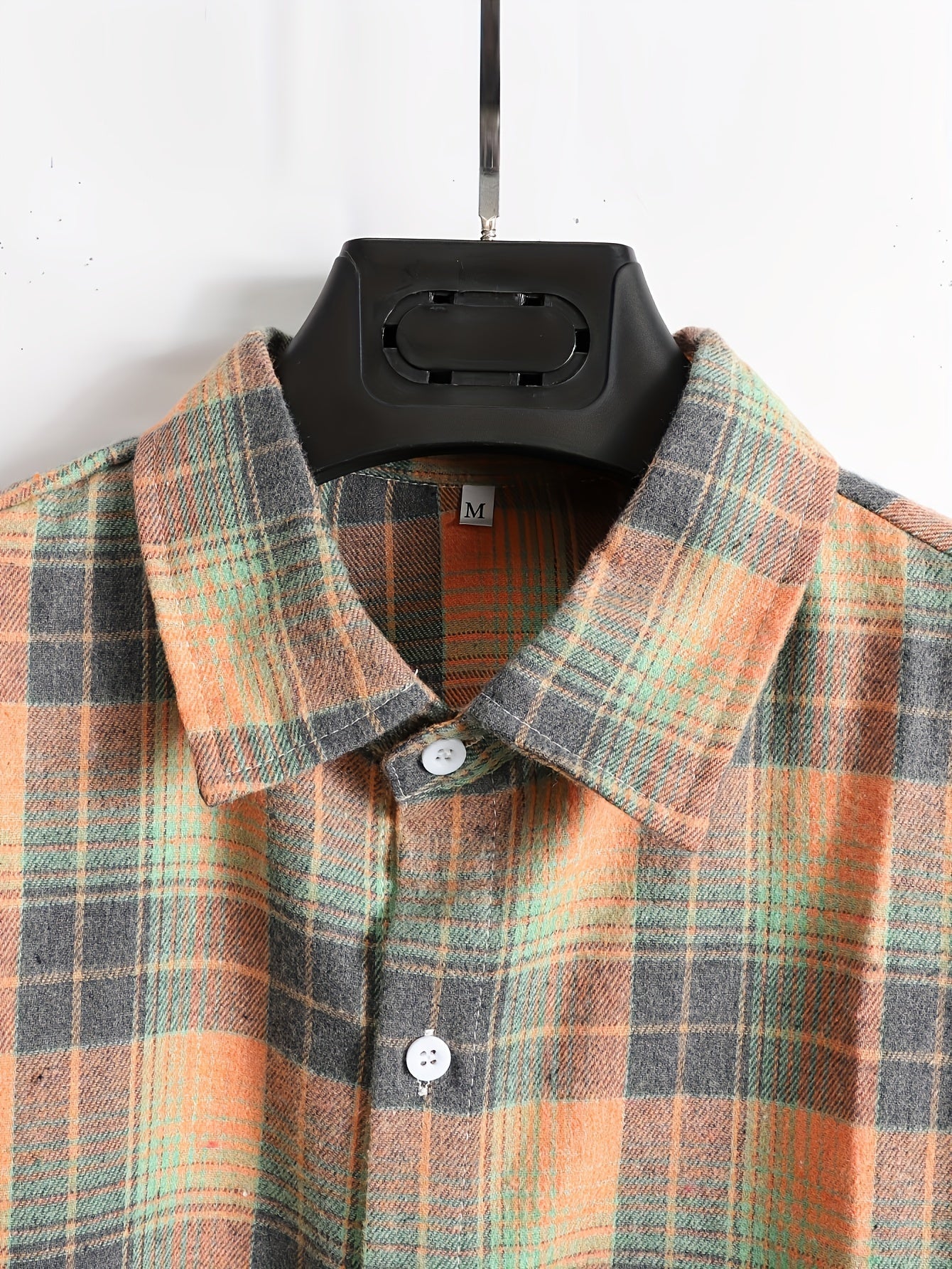 Men's orange and green plaid long-sleeve casual shirt with button placket