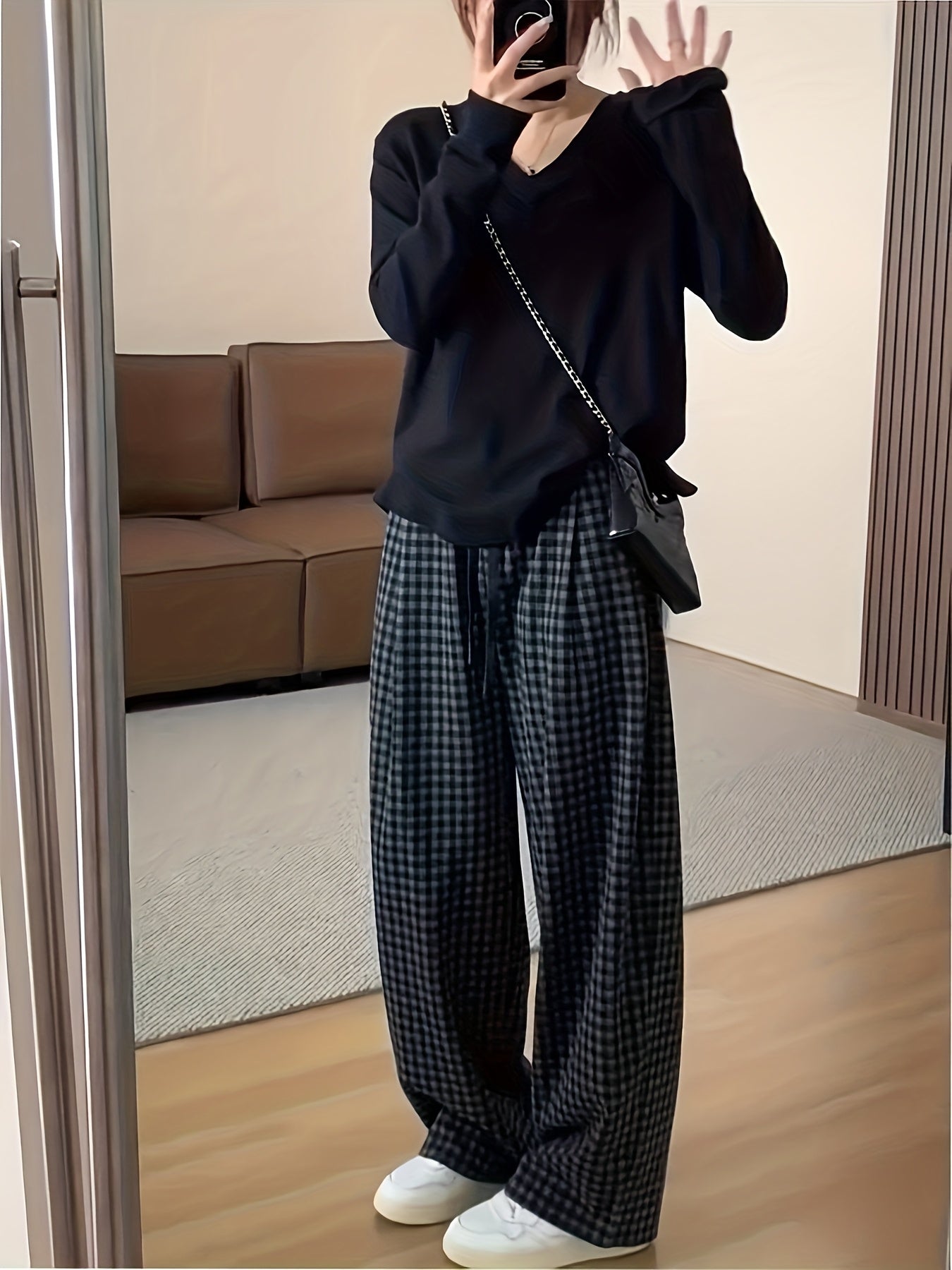 Unisex wide-leg trousers in a gray-and-black gingham pattern