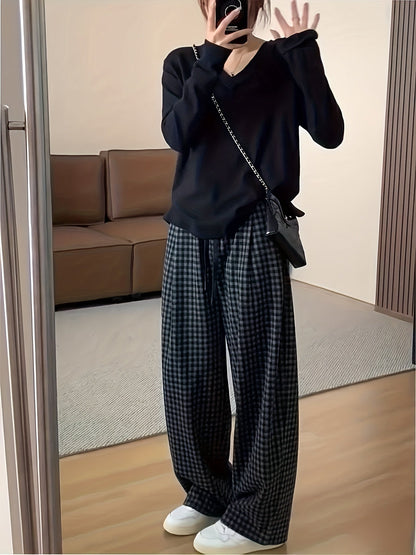 Unisex wide-leg trousers in a gray-and-black gingham pattern