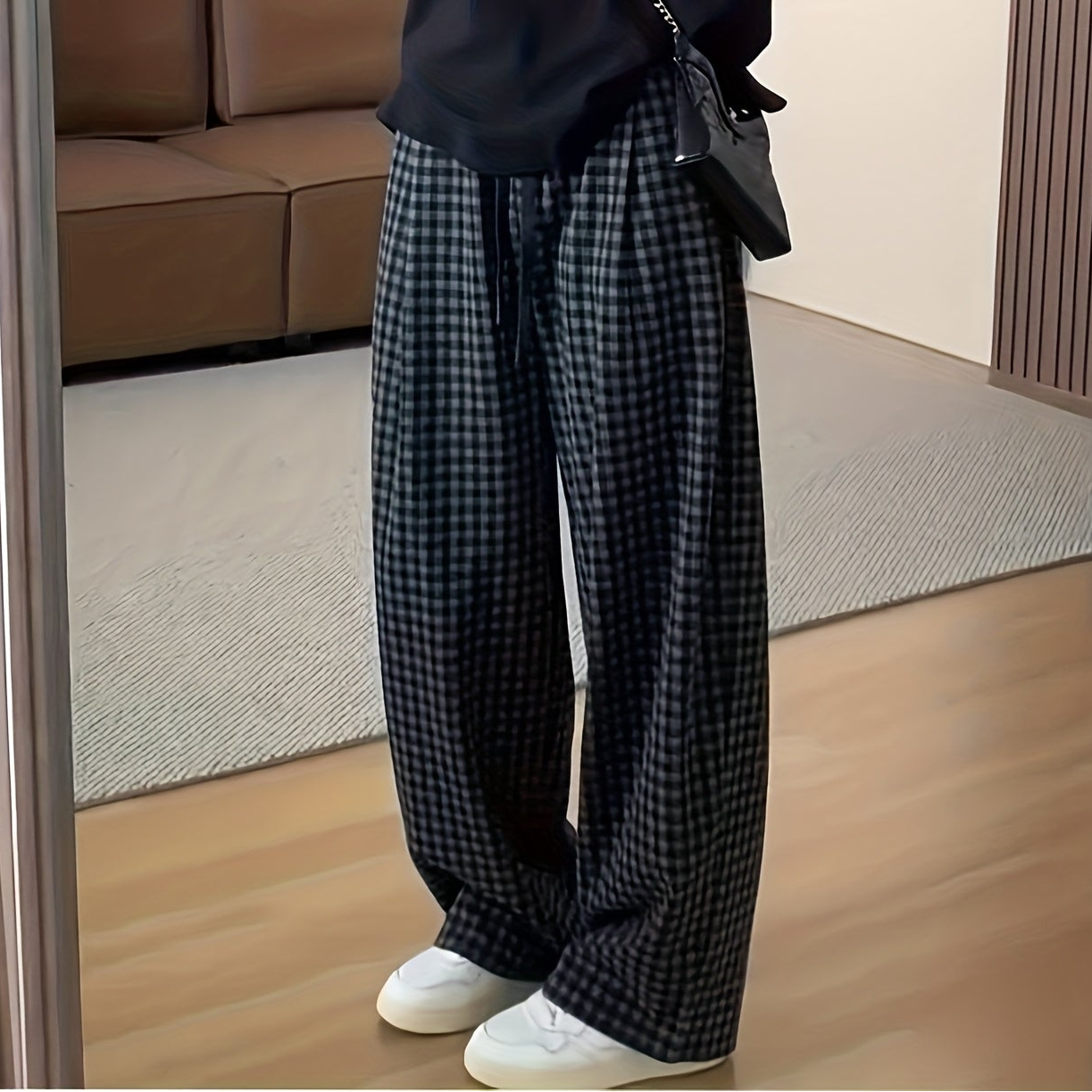 Unisex wide-leg trousers in a gray-and-black gingham pattern