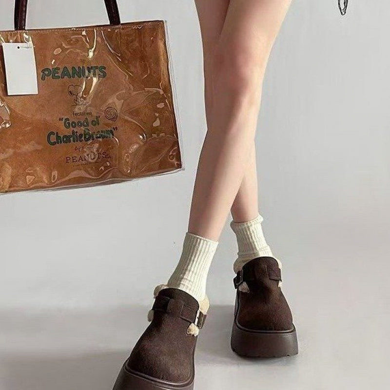 Brown platform moccasins with fur lining and buckle