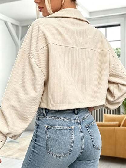 Short women's corduroy jacket with a collar and chest pockets