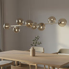 Hanglamp gepoedercoat staal en glas modern Magnus beige met amber kappen 130 cm breed, 8 lichtpunten
