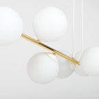 Hanglamp gepoedercoat staal en glas Gravity, wit en goud, 140 cm breed, 8 fittingen E14, verstelbare hoogte