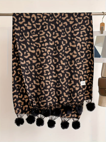 Leopard-print scarf with pom-poms