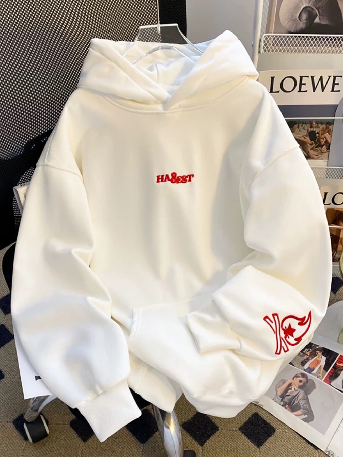 White hooded sweatshirt with red embroidery