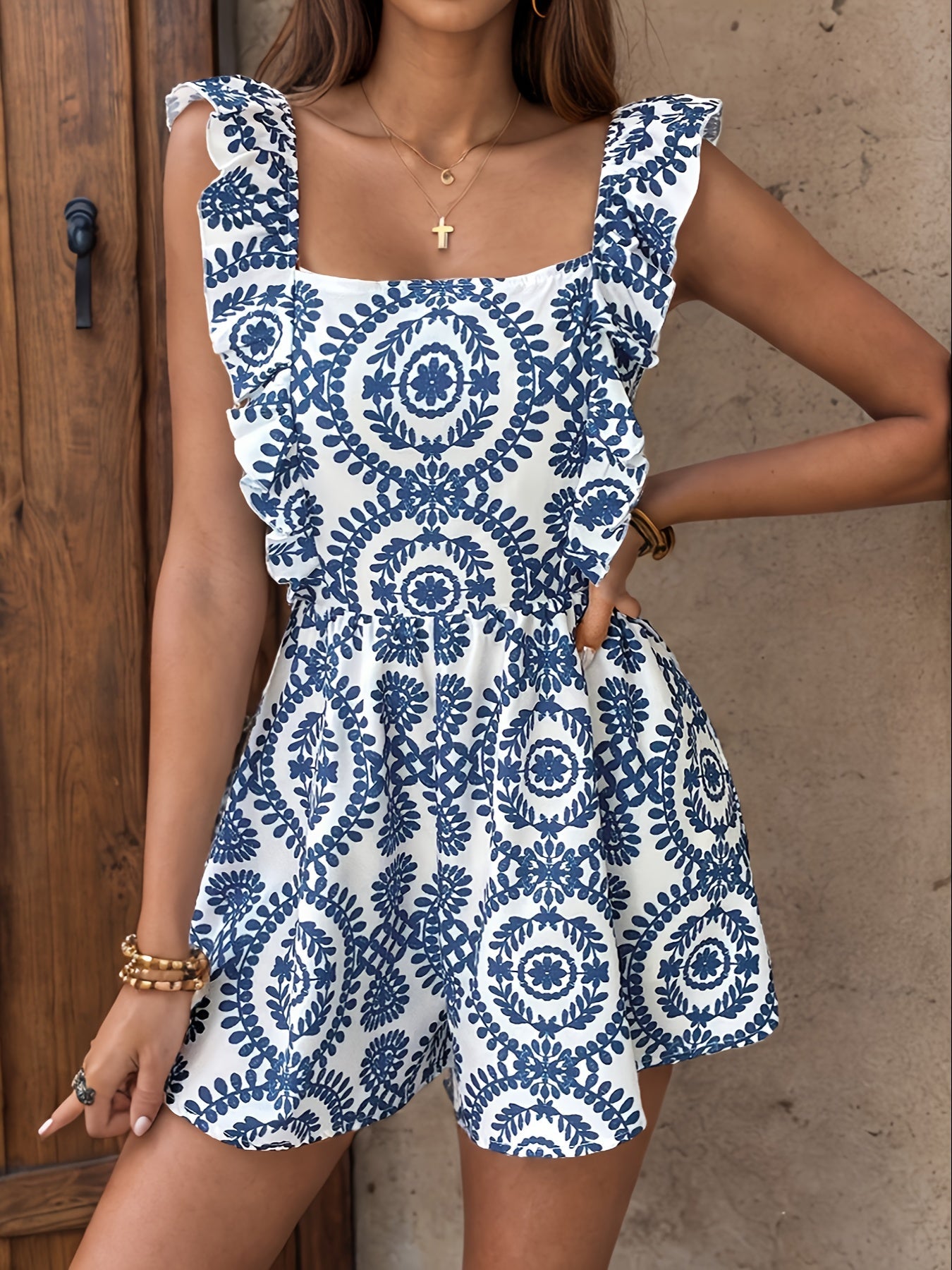 Women's summer jumpsuit in elegant tribal style with ruffle sleeves and square neckline