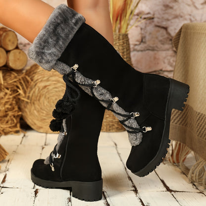 Women's black winter boots with plush trim, laces, and a zipper