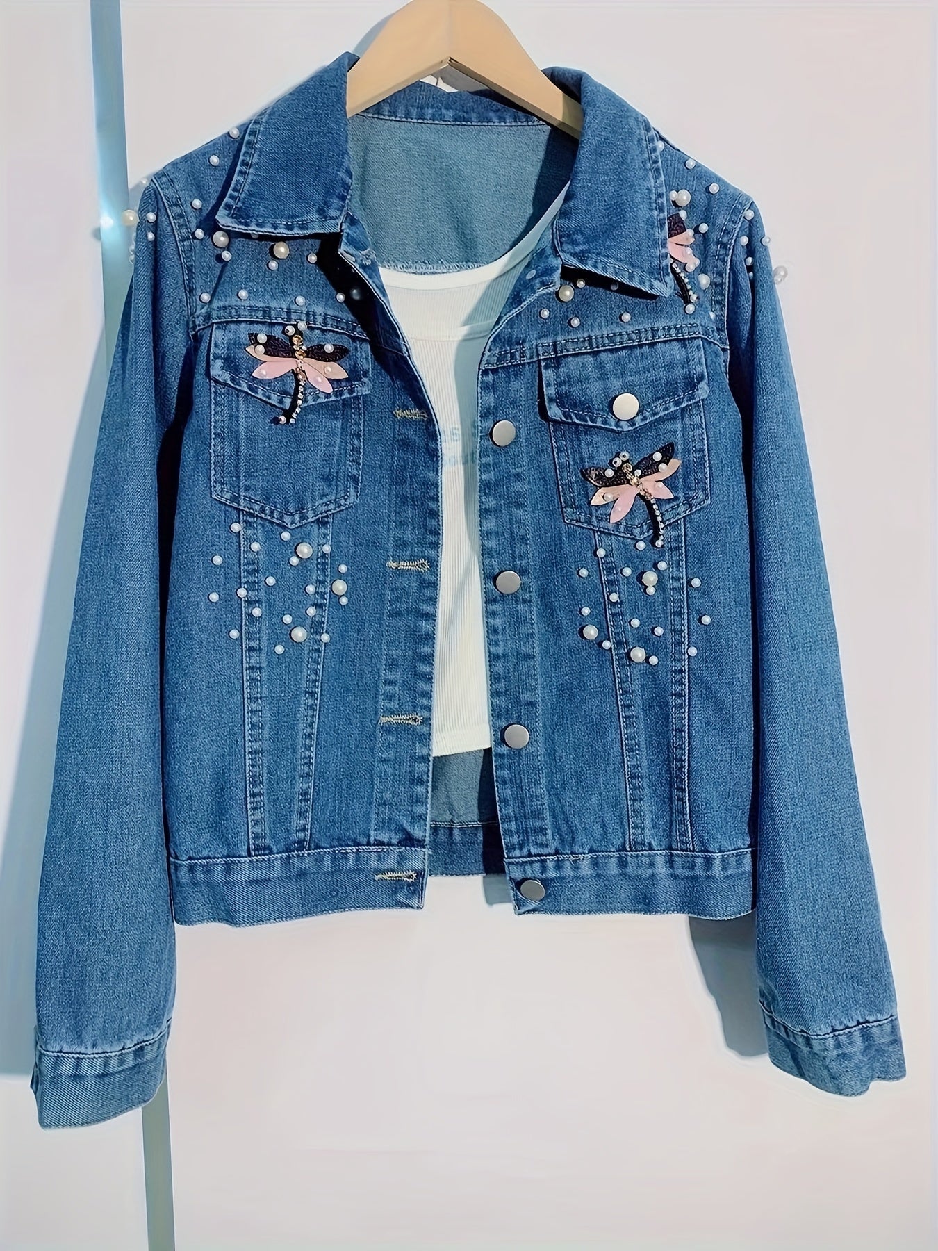 Women's denim jacket with blue pearl embellishments