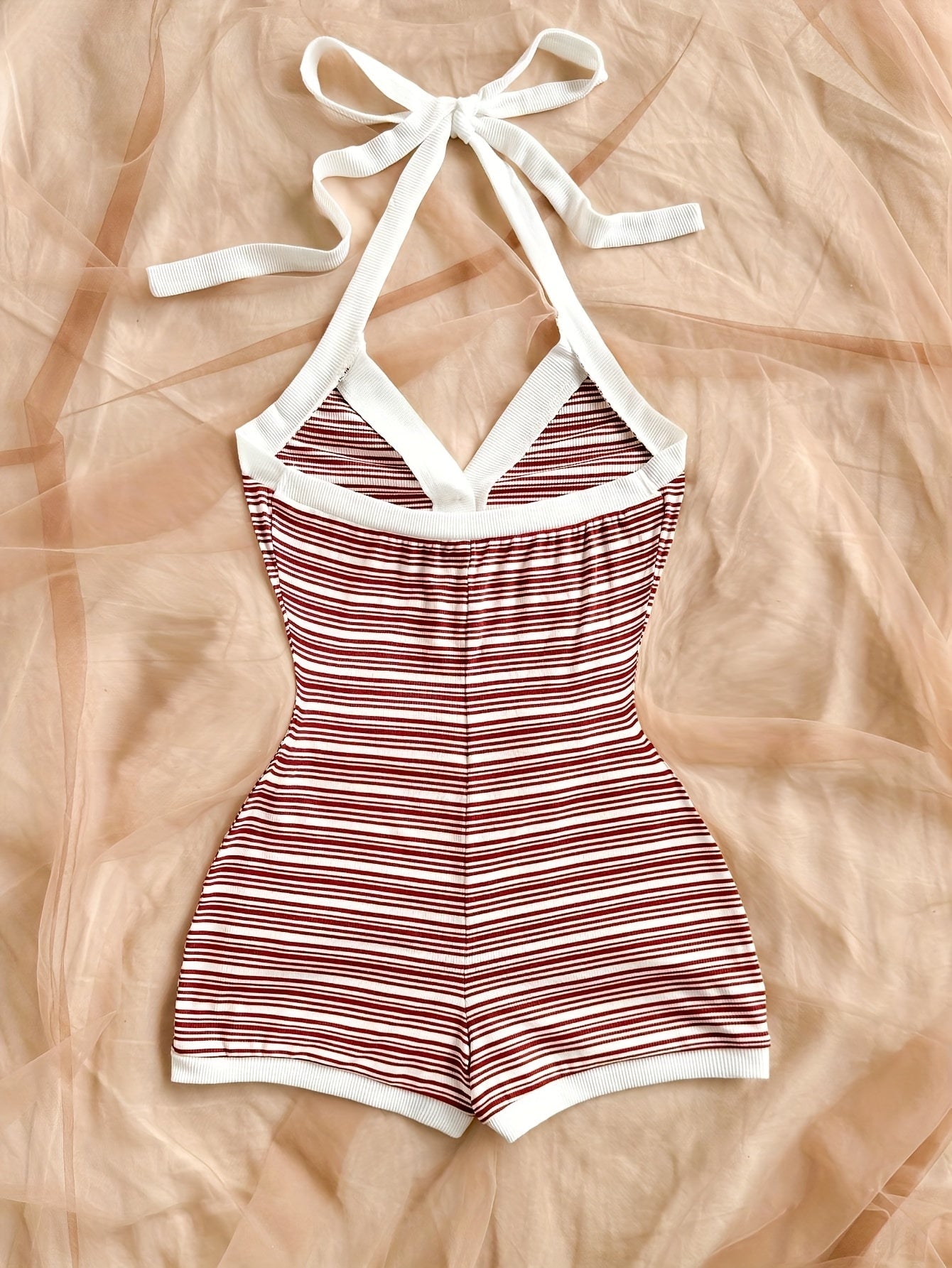 Women's one-piece romper with stripe pattern and button placket – summer fashion for vacation & leisure