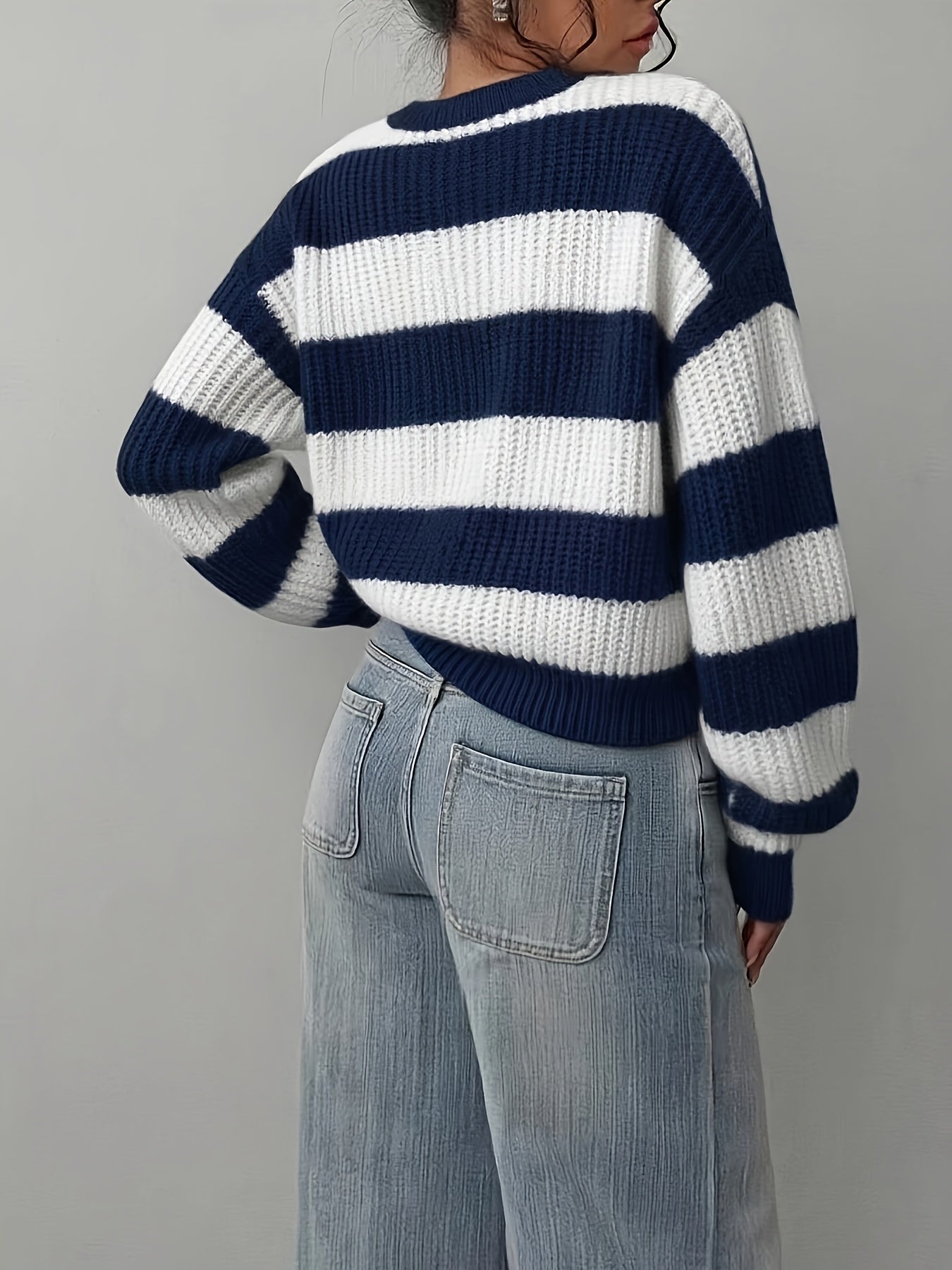 Women's knitted sweater, black and white striped, crew neck, loose fit