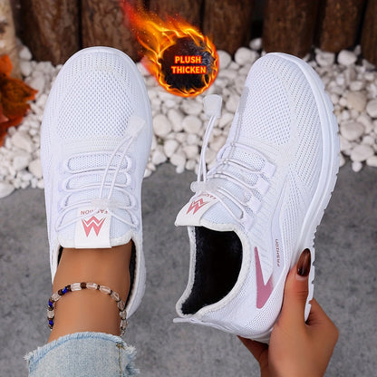 Pink women's sneakers lined with elastic laces