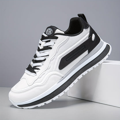 Unisex sneakers in white and black with a lugged sole