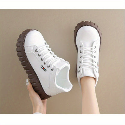 Women’s black lace-up ankle boots with chunky soles