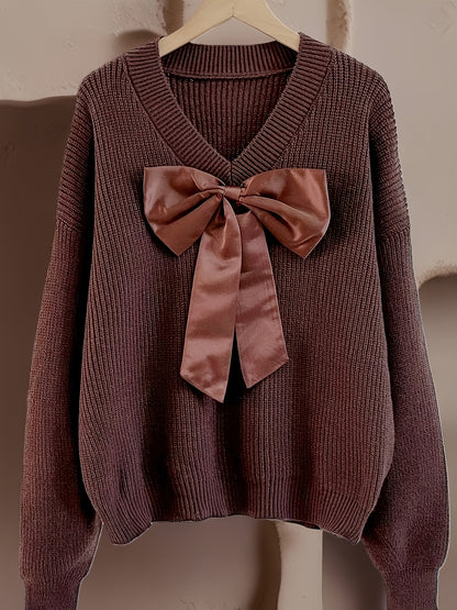 Women's ribbed long-sleeve V-neck sweater with a large bow
