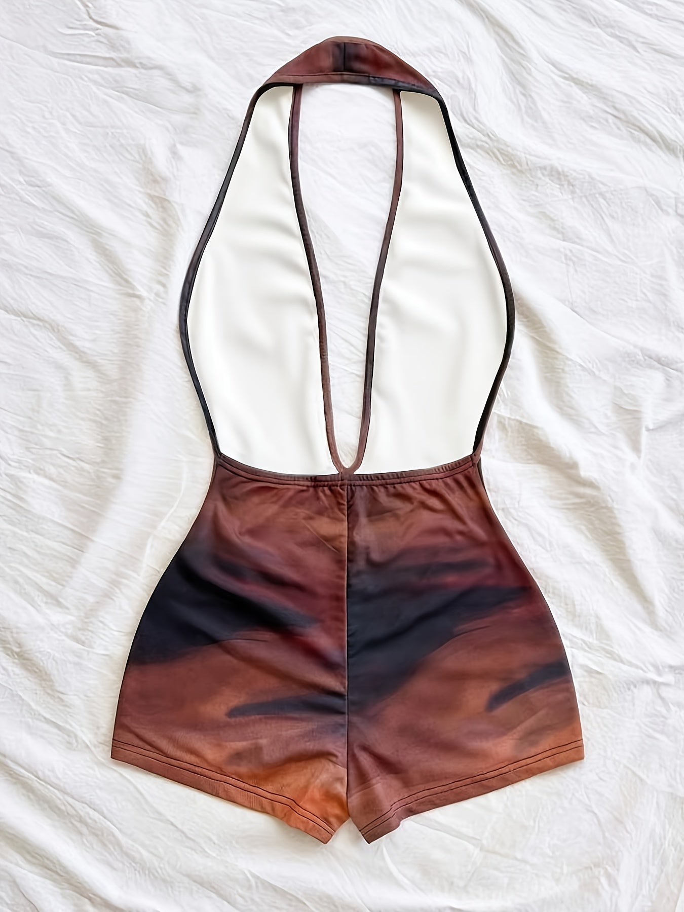 Women's jumpsuit with animal print and deep neckline – fashionable one-piece for summer, beach & party