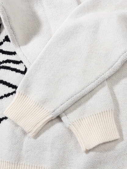Unisex knitted sweater with a round neckline and planet motif – oversized, loose fit