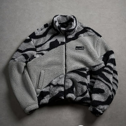 Unisex fleece jacket with stand-up collar, zipper, and animal print