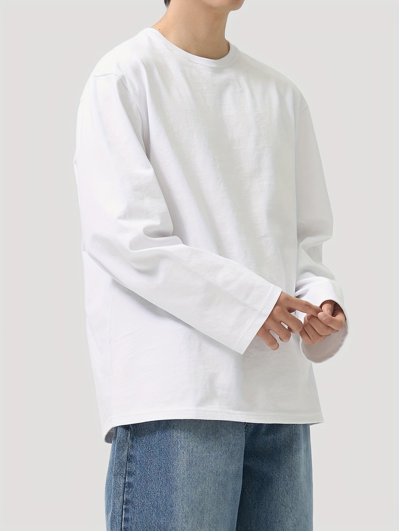 Unisex long-sleeve crew-neck basic shirt, black